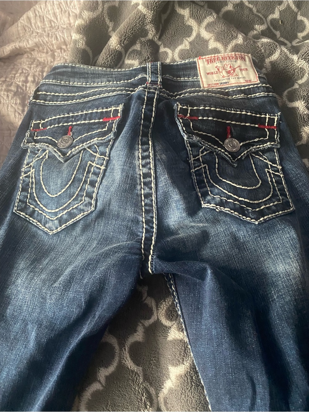 True Religion women’s Indigo Denim Jeans with White Contrast Stitching